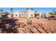 Aerial view of a stucco home with neutral desert landscaping at 5345 E Mercer Ln, Scottsdale, AZ 85254