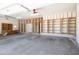 Spacious garage featuring built-in shelving and ample storage space at 5345 E Mercer Ln, Scottsdale, AZ 85254