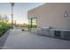 Outdoor kitchen featuring a stainless steel grill and lush landscaping near the pool at 5910 N 45Th St, Phoenix, AZ 85018