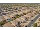 Aerial view of a quiet neighborhood with well-maintained homes and landscaping at 661 E Redondo Dr, Gilbert, AZ 85296