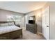 Cozy bedroom featuring soft lighting, neutral tones, and comfortable furnishings for a relaxing retreat at 6938 W Wescott Dr, Glendale, AZ 85308