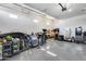 Large garage with high ceilings, ideal for car enthusiasts or hobbyists at 7694 W Desert Spoon Dr, Peoria, AZ 85383