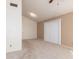 Bedroom featuring vaulted ceiling, carpet and a large vertical blind over sliding glass door at 7737 W Cherry Hills Dr, Peoria, AZ 85345