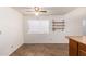 Dining area with a large window and hanging shelves on the wall at 7737 W Cherry Hills Dr, Peoria, AZ 85345