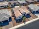 Aerial shot of a home with a tile roof, desert landscaping, and a private backyard at 8009 W Northview Ave, Glendale, AZ 85303