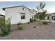 A charming single-story home with desert landscaping, showcasing curb appeal at 8009 W Northview Ave, Glendale, AZ 85303