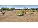 A vibrant and fun-filled playground area with swings, slides, and climbing structures for active  at 8009 W Northview Ave, Glendale, AZ 85303