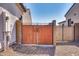 Side yard gate that creates private yard access in residential neighborhood at 8009 W Northview Ave, Glendale, AZ 85303