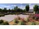 An eye-level view of the attractive Hawes Crossing community entrance sign and landscaping at 8149 E Petunia Ave # 1041, Mesa, AZ 85212