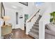 Bright foyer features a staircase and hardwood flooring at 8180 E Shea Blvd # 1038, Scottsdale, AZ 85260