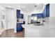 Stylish kitchen with blue cabinets and stainless steel appliances at 8180 E Shea Blvd # 1038, Scottsdale, AZ 85260