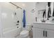 This bathroom features a shower-tub combo, a vanity with a mirror, and a toilet at 8188 N 22Nd Dr, Phoenix, AZ 85021