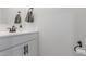 This bathroom features a modern sink, granite countertop, and a decorative towel rack at 8188 N 22Nd Dr, Phoenix, AZ 85021