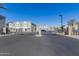 Gated community entrance with modern architecture and manicured landscaping at 8188 N 22Nd Dr, Phoenix, AZ 85021