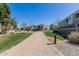 Scenic walking path through lush green lawns and manicured landscaping at 8188 N 22Nd Dr, Phoenix, AZ 85021