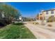 Well-maintained walking path surrounded by grassy areas and landscaped grounds at 8188 N 22Nd Dr, Phoenix, AZ 85021