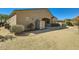 The gravel backyard features an exterior shed and borders a paved patio, offering low-maintenance outdoor living at 9590 W Bajada Rd, Peoria, AZ 85383