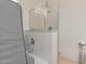 Walk-in shower with glass door and toilet paper holder at 10004 W Raymond Street St, Tolleson, AZ 85353