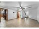 Spacious basement with tile flooring, open layout, and access to stairs and storage at 1235 E Clearview Dr, Casa Grande, AZ 85122