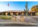 Charming home with mature landscaping, a tile roof, and a circular driveway at 1235 E Clearview Dr, Casa Grande, AZ 85122
