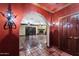 Hallway with archway leading into the main living area with a fireplace at 1235 E Clearview Dr, Casa Grande, AZ 85122