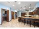 Gourmet kitchen featuring custom cabinetry, granite counters, and stainless steel appliances at 1235 E Clearview Dr, Casa Grande, AZ 85122