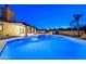 Backyard with a pool and spacious covered patio at 1235 E Clearview Dr, Casa Grande, AZ 85122