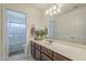 Bathroom vanity area with a sink and a big mirror at 12901 W Wilshire Dr, Avondale, AZ 85392