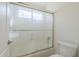 Shower and toilet area with sliding doors at 12901 W Wilshire Dr, Avondale, AZ 85392