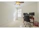 Neutral bedroom with a desk and two monitors at 12901 W Wilshire Dr, Avondale, AZ 85392