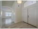 Bright entryway with tiled floors leading to other rooms in the home at 12901 W Wilshire Dr, Avondale, AZ 85392