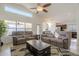 Inviting living room with access to the dining area and outdoor space at 12901 W Wilshire Dr, Avondale, AZ 85392