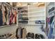Organized walk-in closet with built-in shelving and ample storage space at 12901 W Wilshire Dr, Avondale, AZ 85392