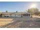 Backyard featuring an outdoor space with gravel and rock landscaping for easy maintenance at 12946 W Maplewood Dr, Sun City West, AZ 85375