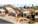 Expansive aerial view of a home with a three-car garage and solar panels at 1302 E Voltaire Ave, Phoenix, AZ 85022