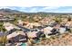 Community aerial view showcasing tile roofs, private pools, lush landscaping, and mountain views at 1302 E Voltaire Ave, Phoenix, AZ 85022