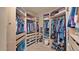 Spacious walk-in closet with custom shelving and ample storage space at 1302 E Voltaire Ave, Phoenix, AZ 85022