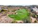 Lush green golf course with manicured fairways, sand traps, and desert landscape in background at 1302 E Voltaire Ave, Phoenix, AZ 85022