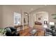 Cozy living room with hardwood floors, ample natural light, and neutral decor creating a relaxing atmosphere at 1302 E Voltaire Ave, Phoenix, AZ 85022