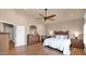 Main bedroom with vaulted ceiling and a wooden dresser and door at 1302 E Voltaire Ave, Phoenix, AZ 85022