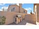 Outdoor space with a BBQ grill, an outdoor kitchen, privacy wall, and desert landscaping at 1302 E Voltaire Ave, Phoenix, AZ 85022