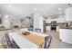 Open concept dining area next to a modern kitchen, perfect for entertaining Gathering and friends at 13534 W Young St, Surprise, AZ 85374