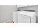 Bright laundry room with white washer and dryer at 13534 W Young St, Surprise, AZ 85374