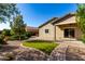 This backyard has desert landscaping, a patio and a patch of artificial grass at 141 W Jamaica Pl, Casa Grande, AZ 85122