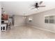 Spacious living room with tile floors and natural light from the large windows at 141 W Jamaica Pl, Casa Grande, AZ 85122