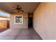 Covered patio area with a ceiling fan, providing a relaxing outdoor space at 141 W Jamaica Pl, Casa Grande, AZ 85122