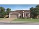Charming single-story home featuring a 2-car garage, neutral stucco, and a brick-paved driveway leading to a lush green lawn at 1482 W Ridge Rd, Apache Junction, AZ 85120