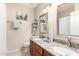 Bright bathroom with double sinks, modern fixtures, and stylish decor at 16601 S 16Th Dr, Phoenix, AZ 85045
