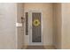 Inviting front entrance featuring a decorative screen door and wreath at 16601 S 16Th Dr, Phoenix, AZ 85045