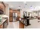 Gourmet kitchen featuring stainless steel appliances, granite counters, and abundant cabinetry at 16601 S 16Th Dr, Phoenix, AZ 85045
